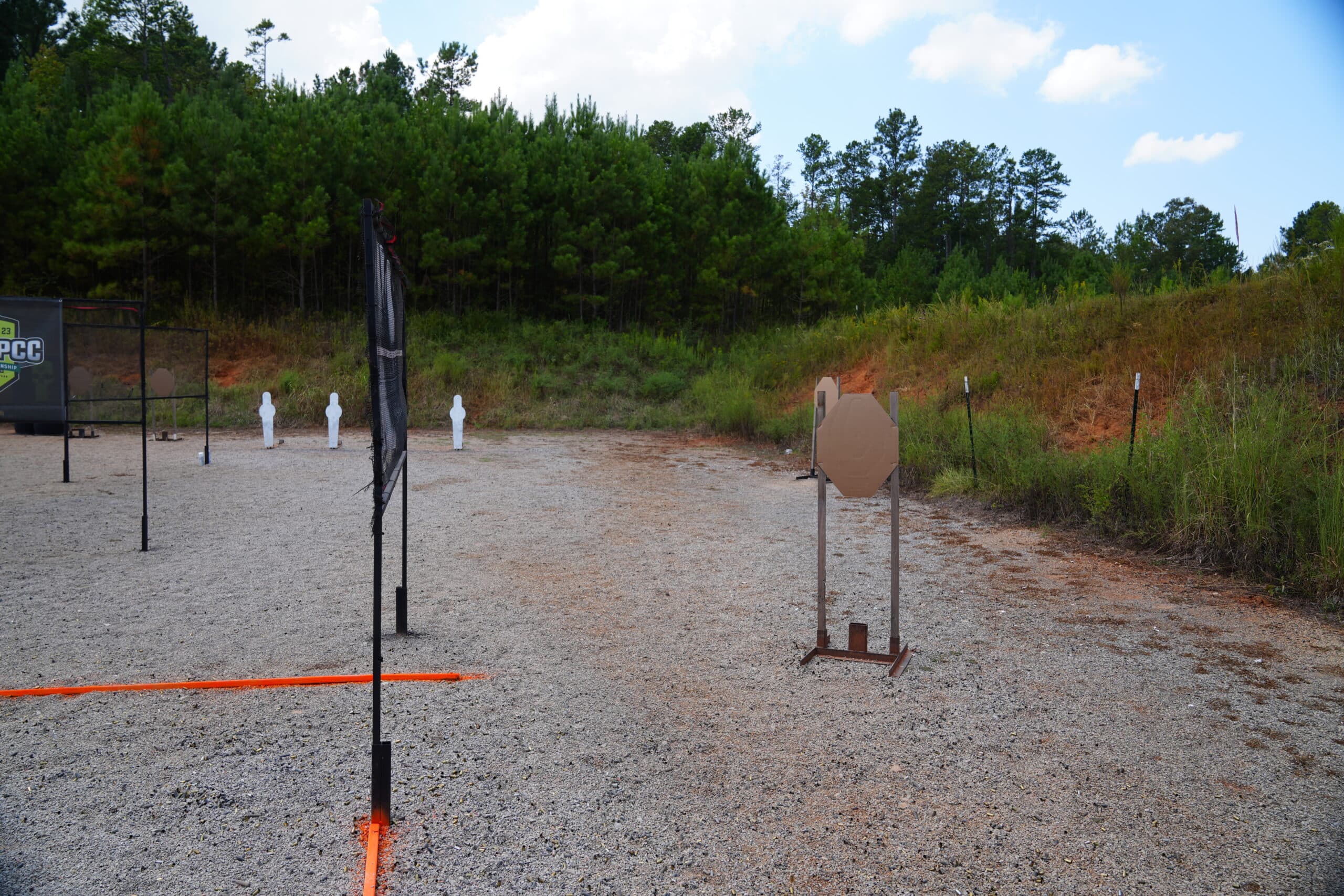 USPSA shooting range with targets set up for practical shooting competition